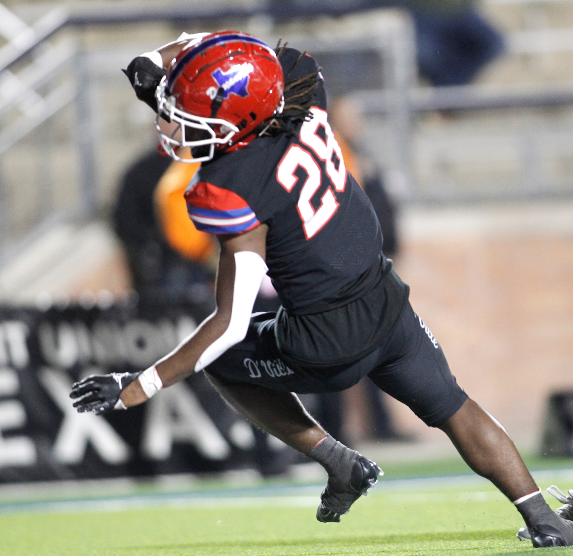 Duncanville running back Devine Green (28) spins out of an attempted tackle to score a...