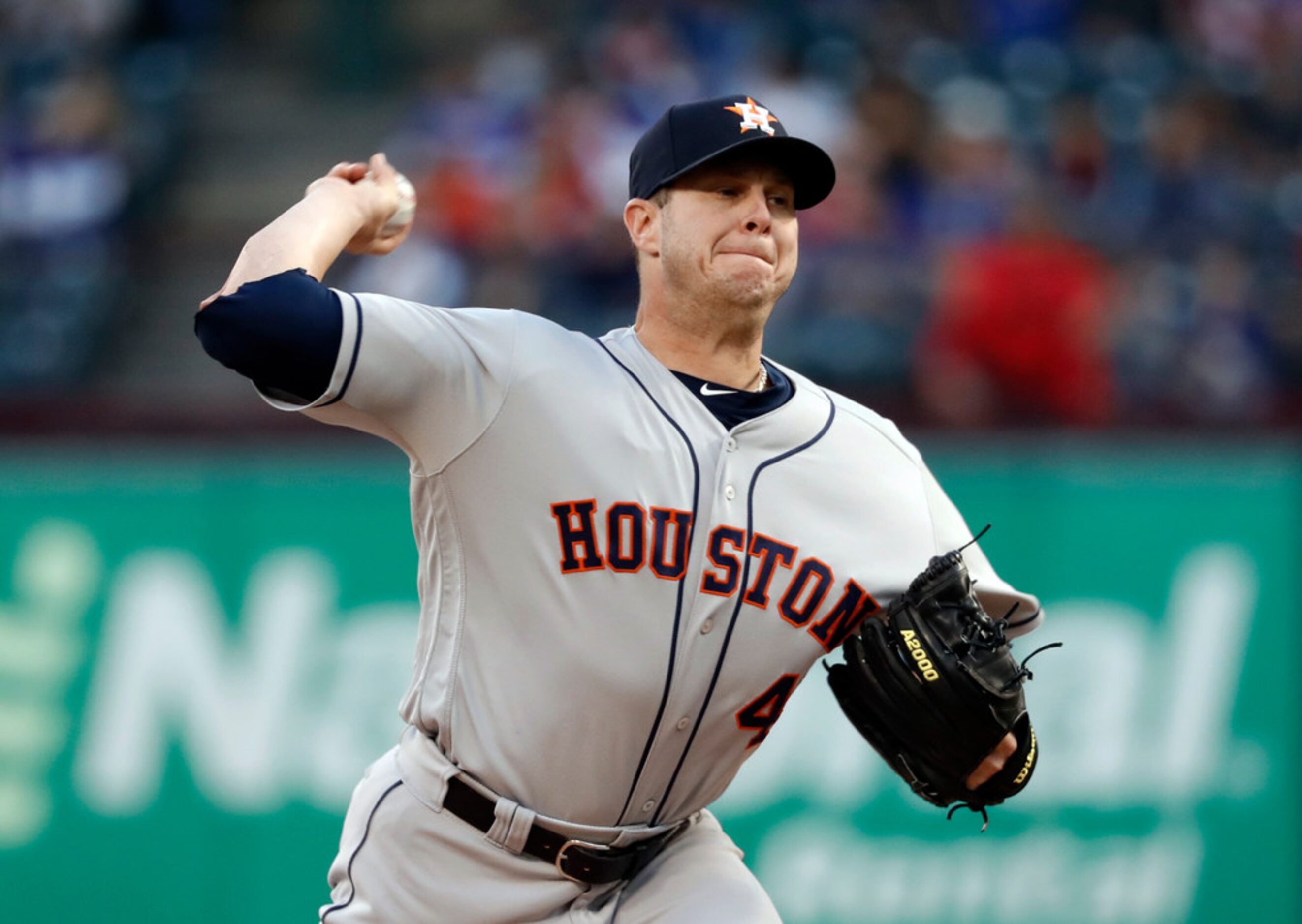 Houston Astros relief pitcher Brad Peacock (41) throws to the Texas Rangers in the first...