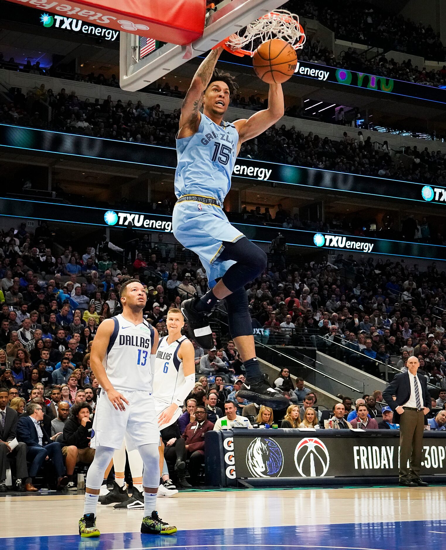 Memphis Grizzlies forward Brandon Clarke (15) dunks the ball past Dallas Mavericks guard...