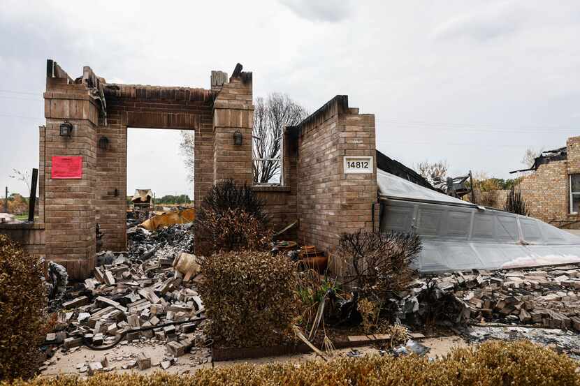 Destroyed houses by a grass fire in Balch Spring on Aug. 10.
