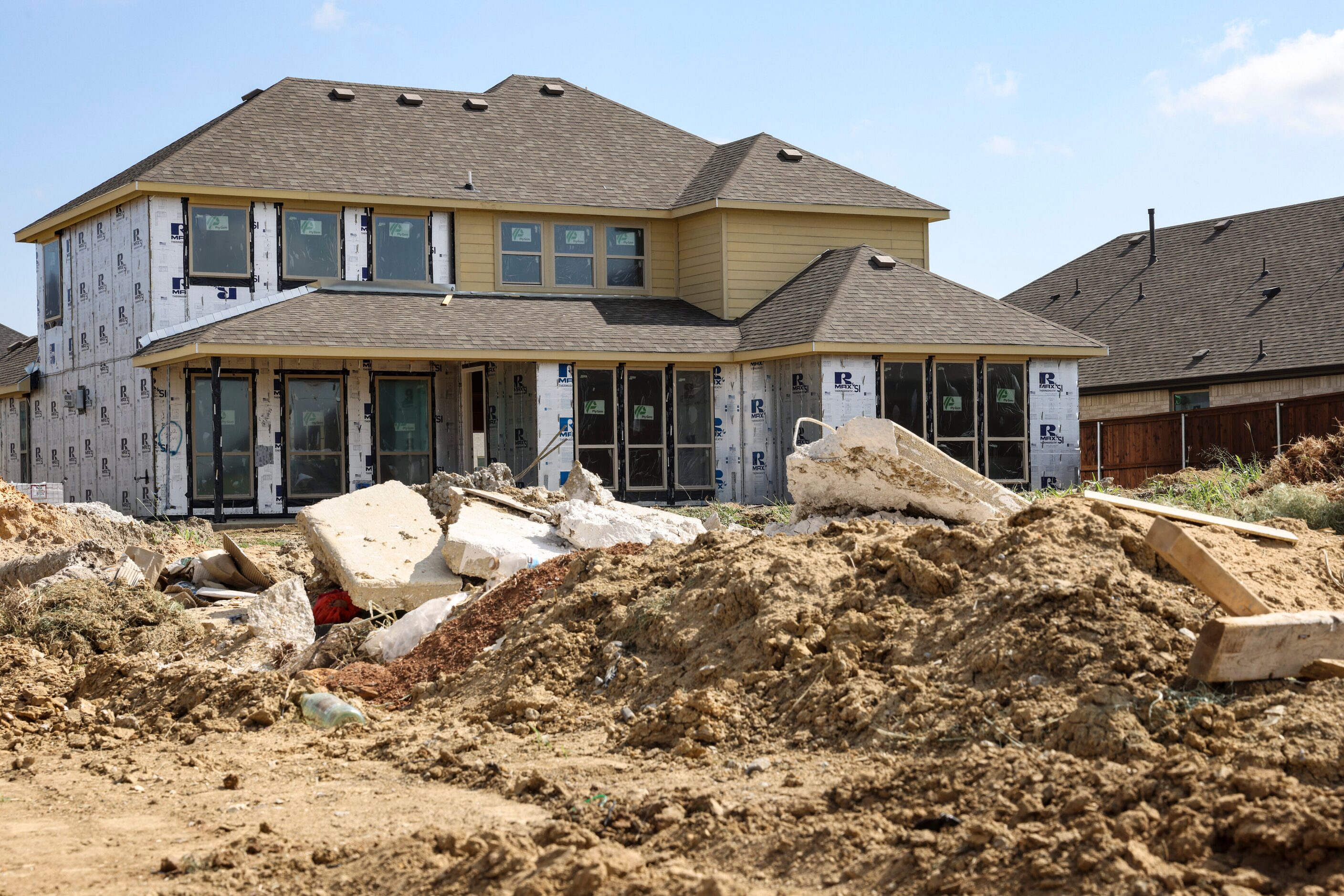 Homes are shown under construction in Mansfield's M3 neighborhood.