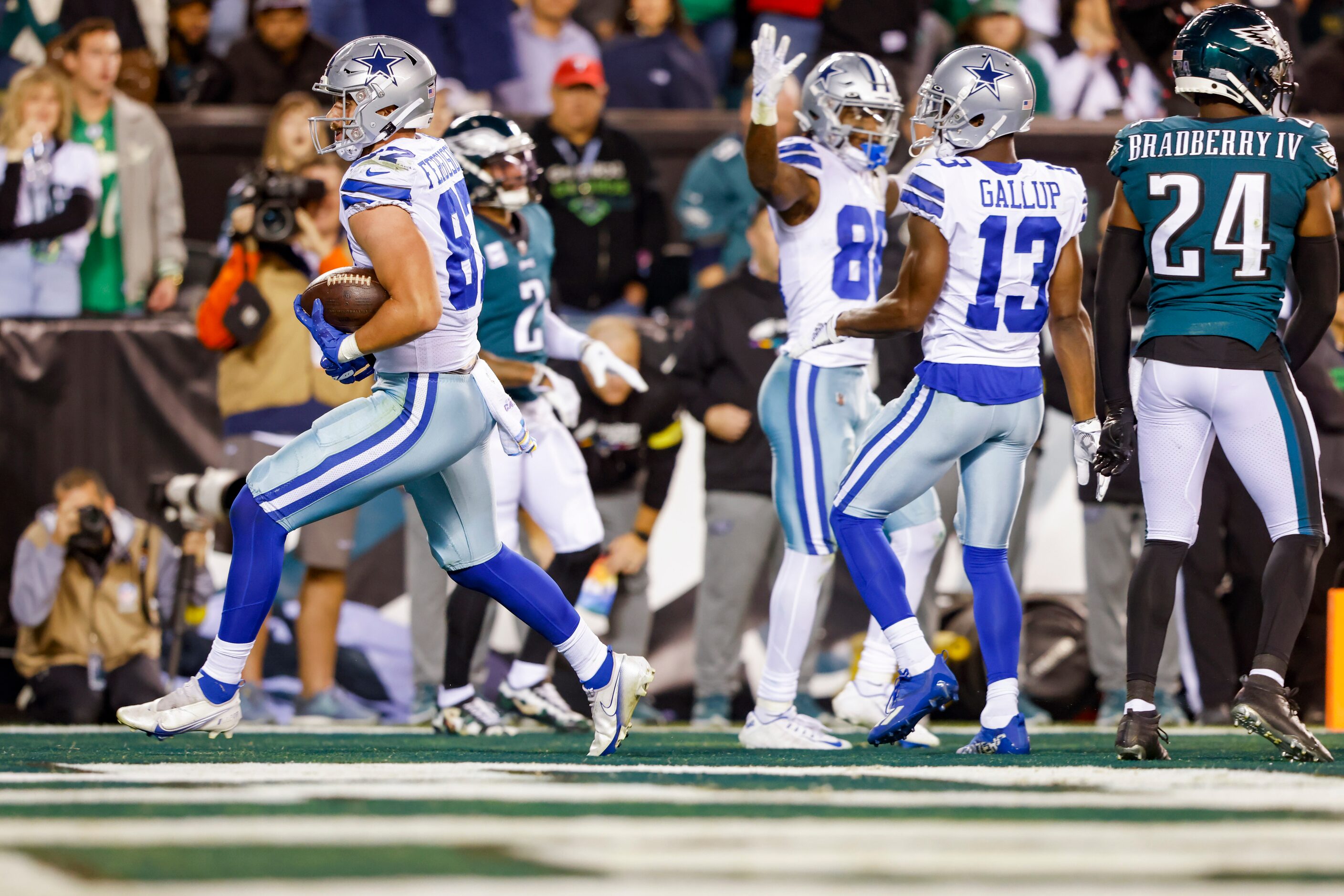 Dallas Cowboys tight end Jake Ferguson (87)] runs into the end zone during the fourth...