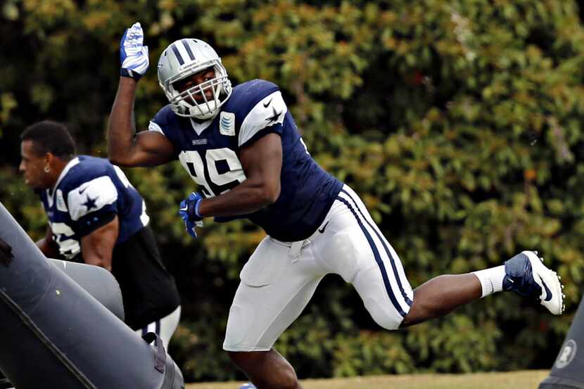 Dallas Cowboys defensive end Ryan Russell runs a drill during practice Wednesday, October...