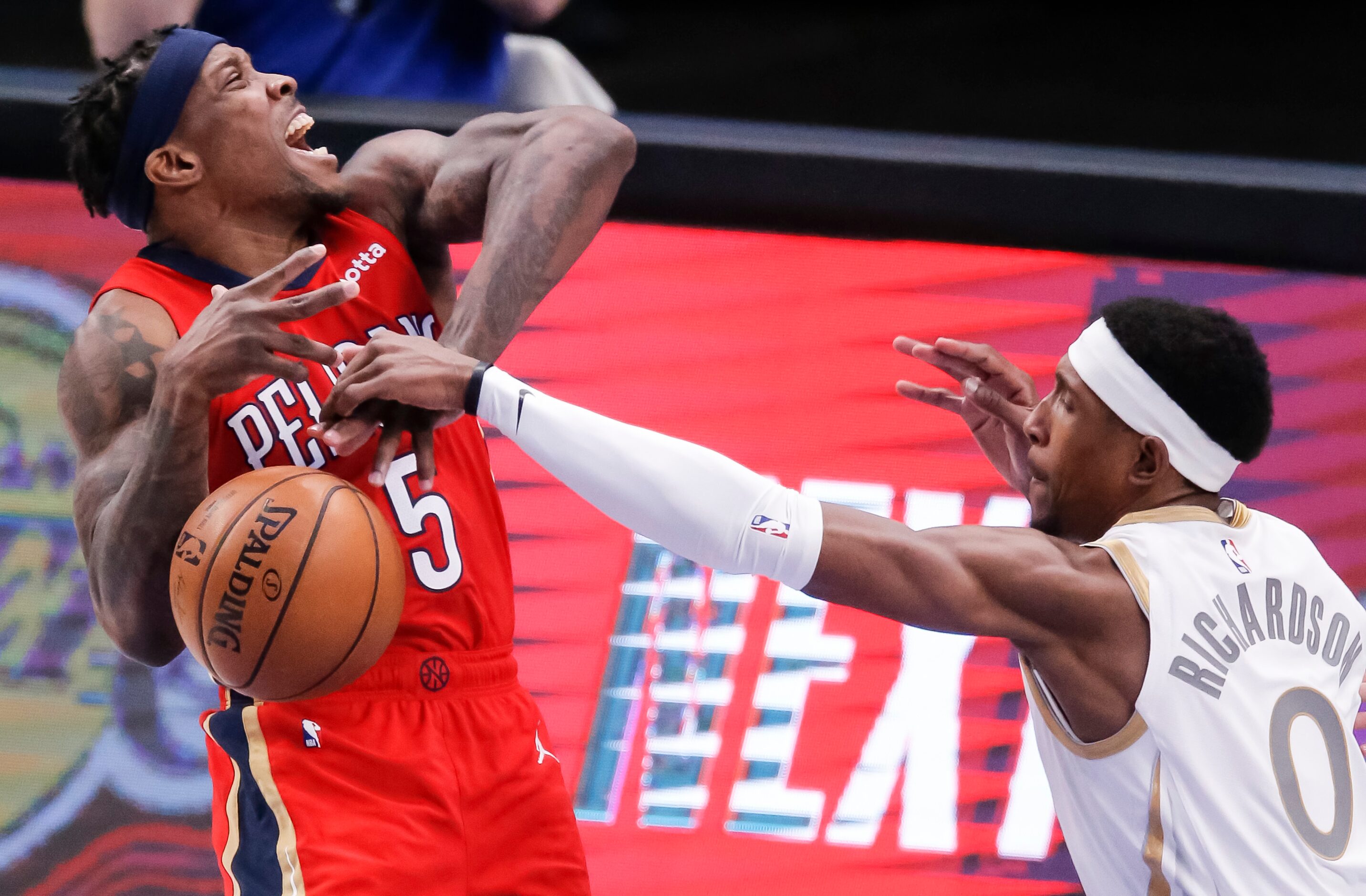 Dallas Mavericks guard Josh Richardson (0) fouls New Orleans Pelicans guard Eric Bledsoe (5)...