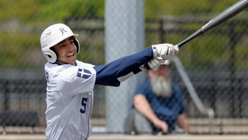 Jesuit shortstop Jordan Lawlar swings for a pitch during a district 7-6A game against...