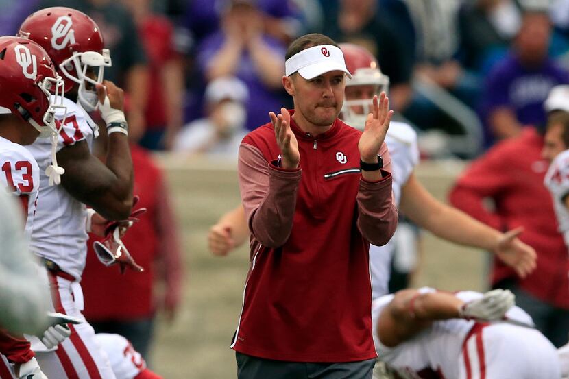 Oklahoma head coach Lincoln Riley applauded his team before an NCAA college football game...