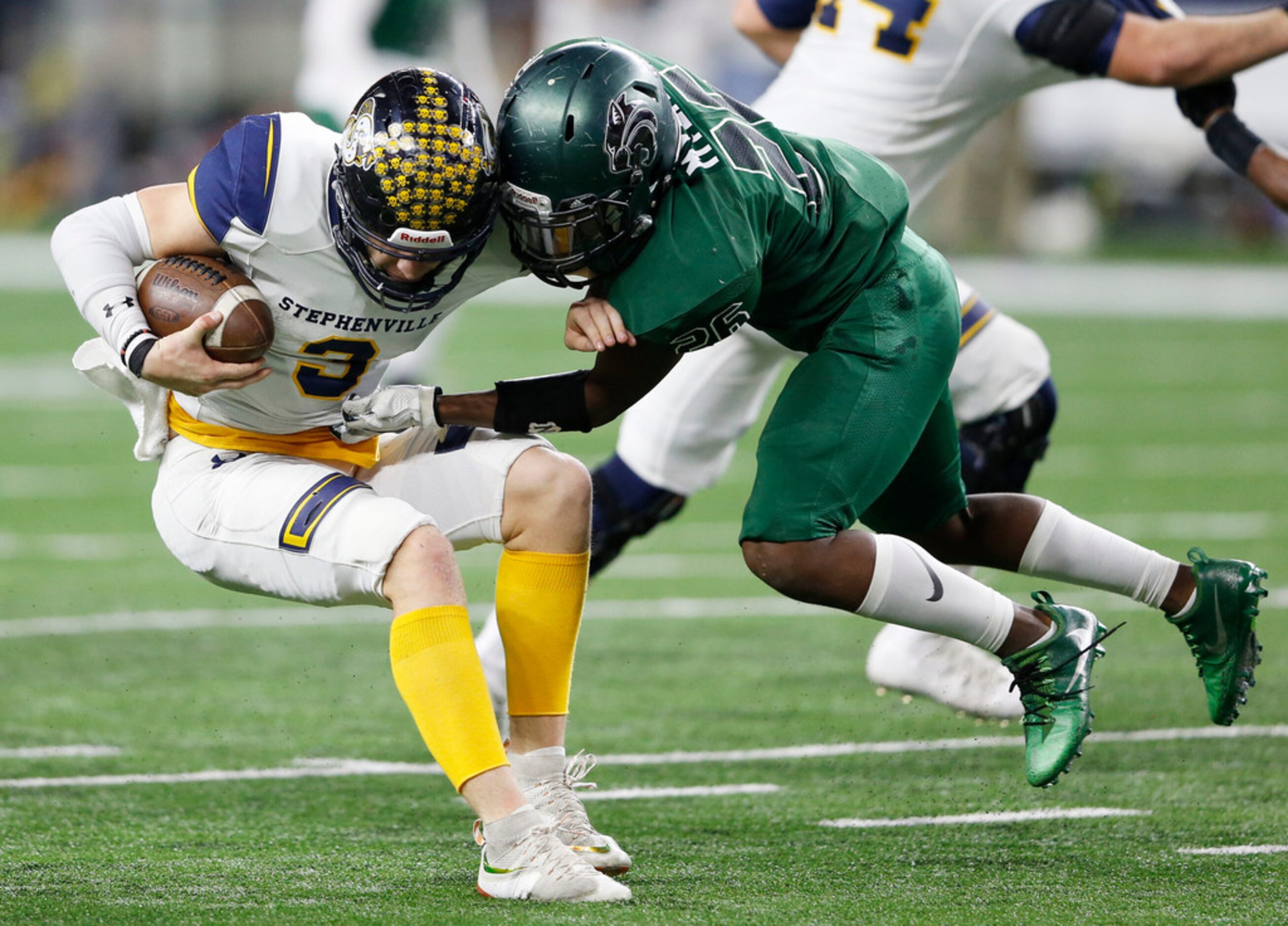 Kennedale's Jalen Myers (26) sacks Stephenville's Easton Jones (3) during the first half of...