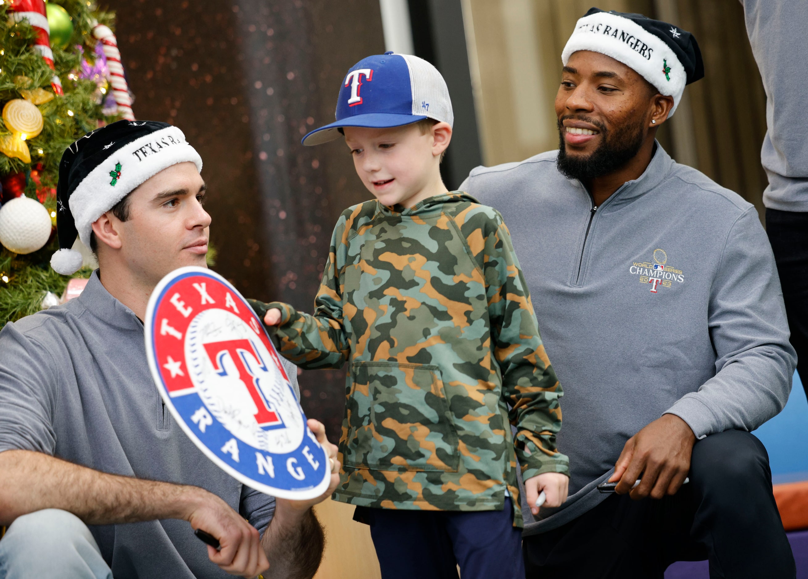 Medical City Children’s Hospital patient Beckham Tekell, 5, of Dallas, center, receives an...