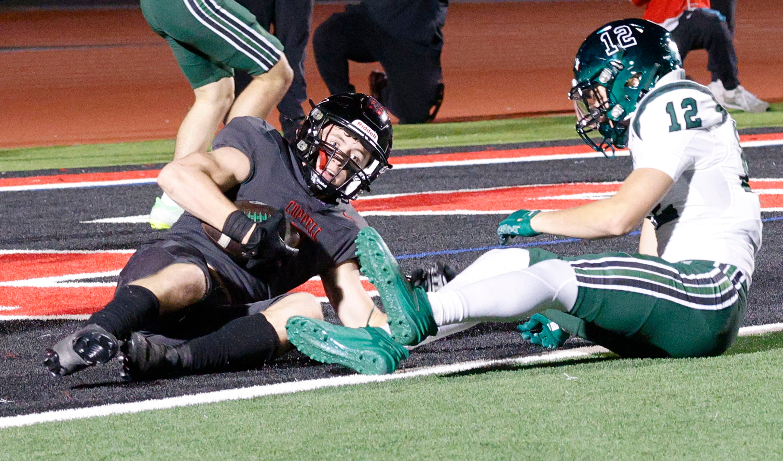 Coppell's Scott Fishpaw (4) intercepts a pass intended for Prosper's Elliot Brown (12) in...