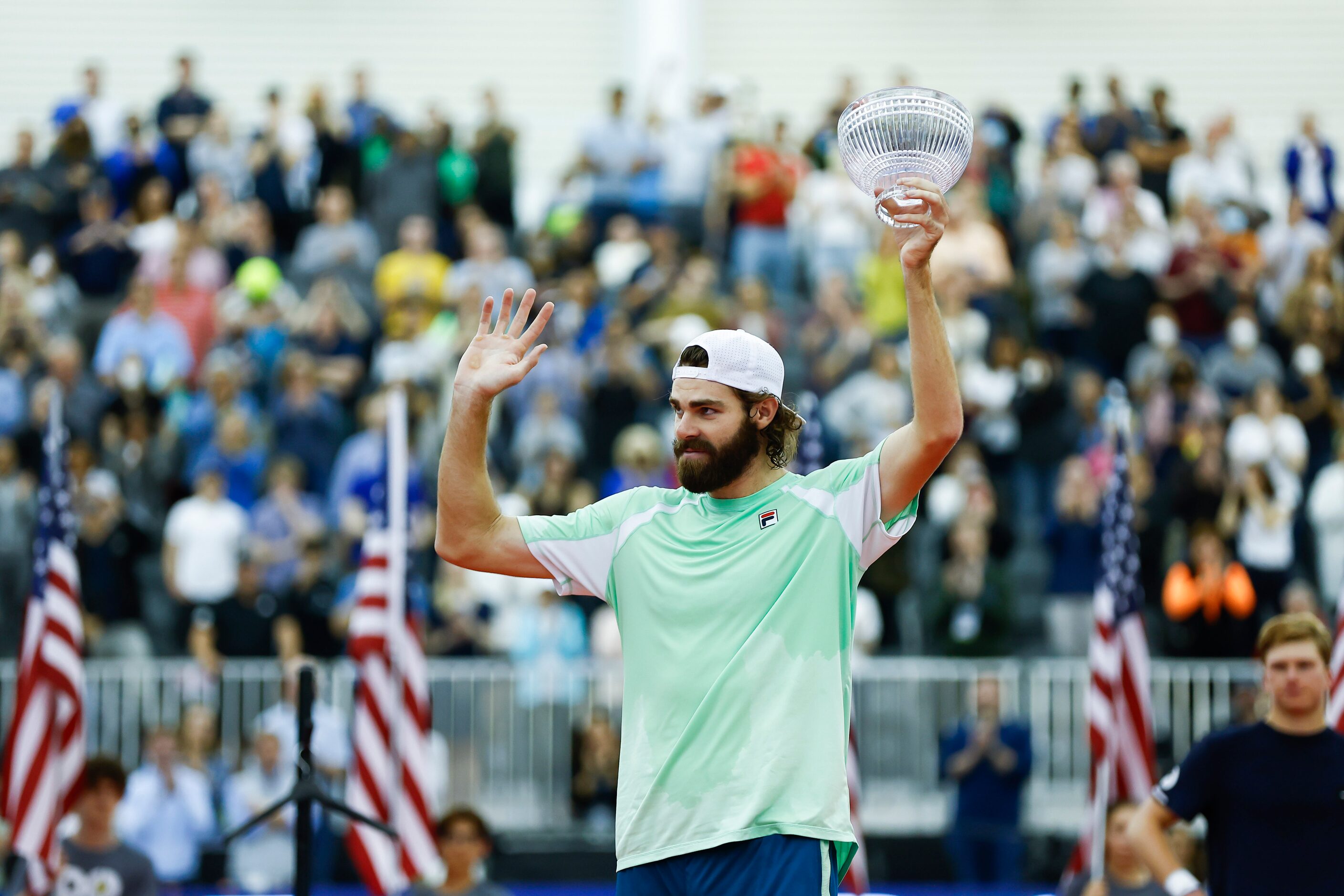 Reilly Opelka celebrates winning the finals ATP Dallas Open against Jenson Brooksby at The...