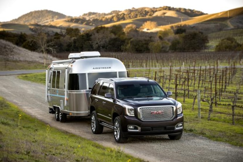
The 2015 version of the GMC Yukon Denali still stands over 6 feet tall and weighs 5,500...