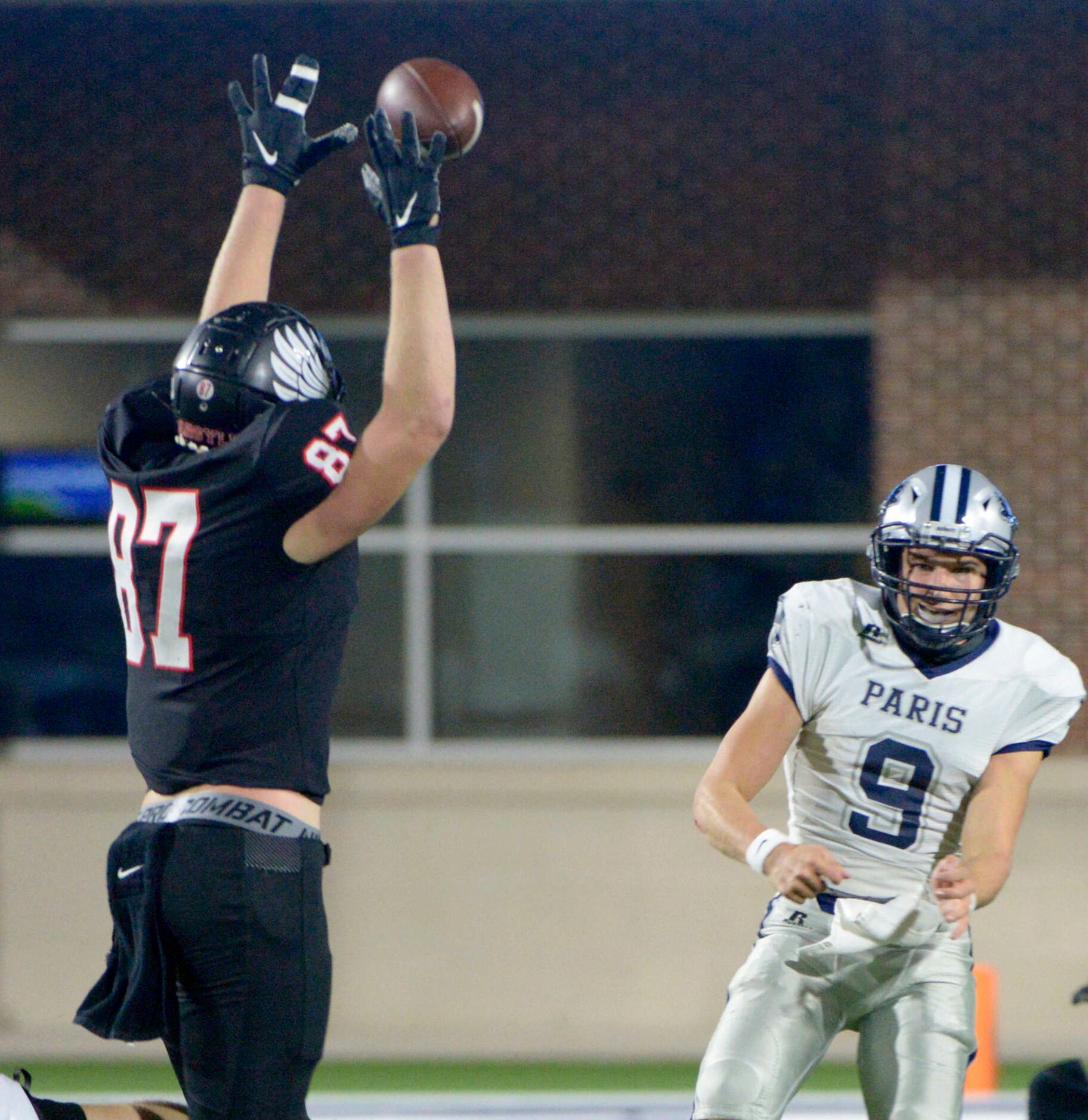 Paris quarterback Luke Hohenberger (9) has his pass deflected by Argyle’s Jasper Lott (87)...