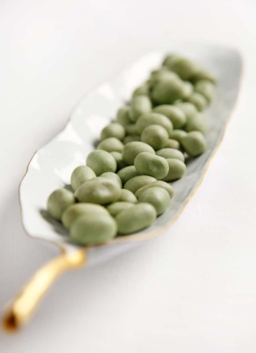 Wasabi peanuts keep it simple and sophisticated. Small willow leaf platter from Napa Home,...