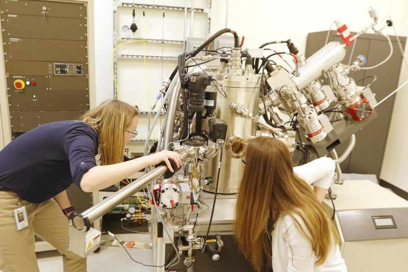  UT-Dallas chemistry grad students  Jenny Orbeck (left) and Ashley Ellsworth used an X-ray...