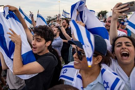 Hundreds of demonstrators attend the Israeli side of a demonstration on Preston Road in Far...