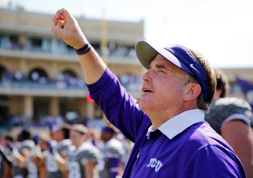 TCU head coach Gary Patterson sings the school fight song after the game against the Texas...