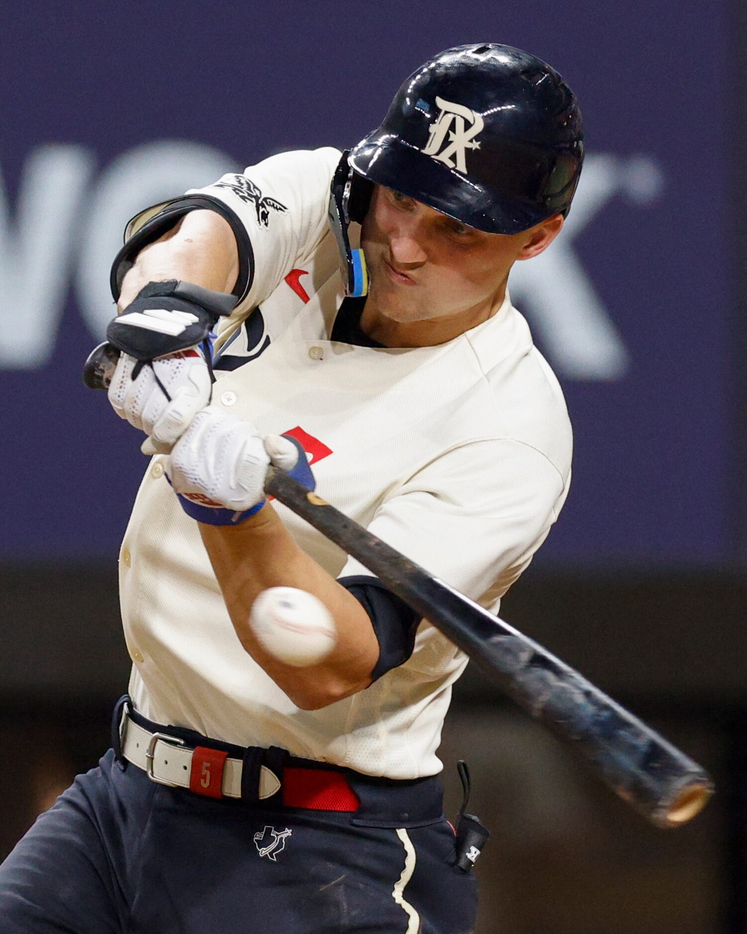 Texas Rangers shortstop Corey Seager (5) swings at a pitch during the eighth inning of a...