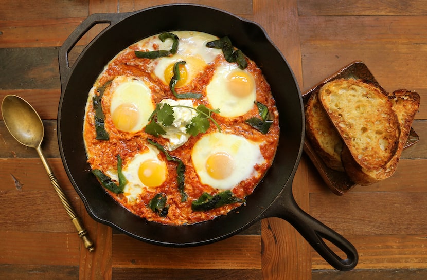 Eggs poached in spiced tomato-Harissa sauce