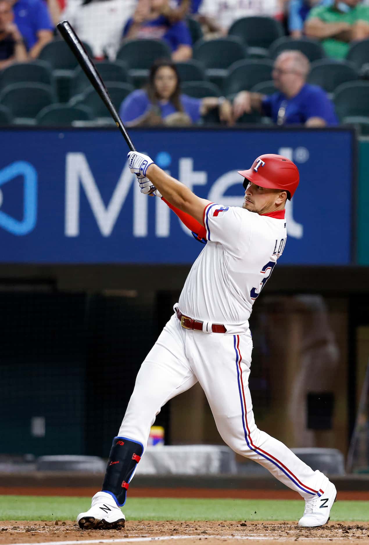 Texas Rangers batter Nate Lowe (30) connects on a two-run homer during third inning against...