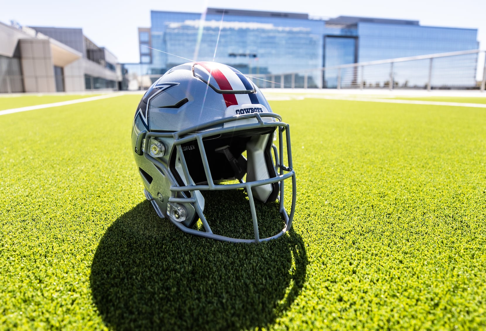 What was the reaction of Cowboys players to Dallas bringing back its red  stripe helmets?