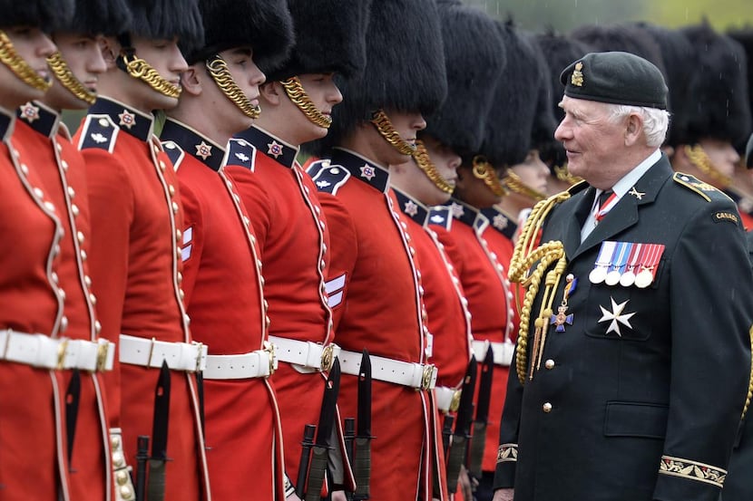 
Canada Governor General David Johnson inspects an honour guard during in Ottawa on May 14,...