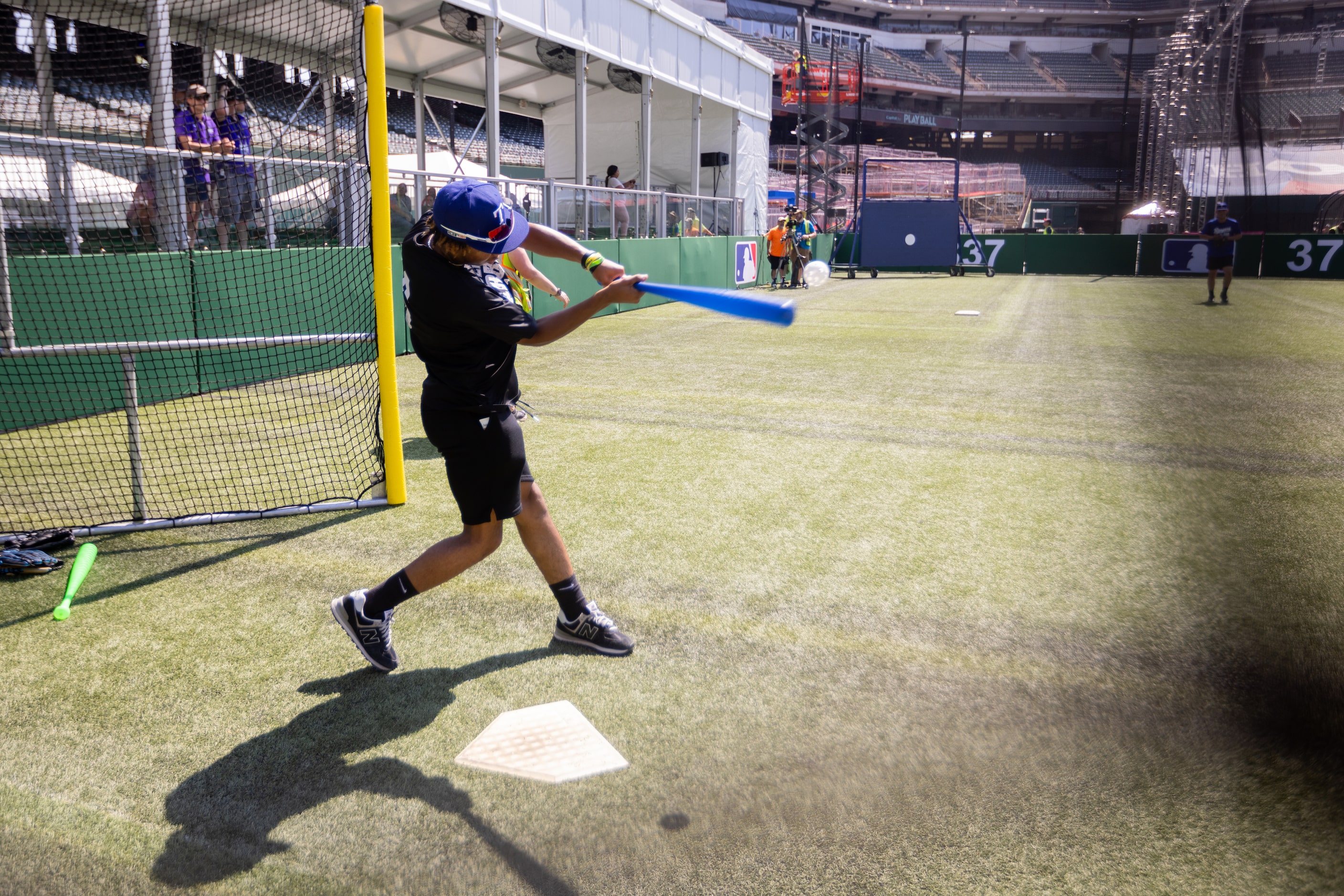 Texas Rangers Academy’s Vincent Hood, 15, of Mansfield hits the Wiffle ball at MLB's...