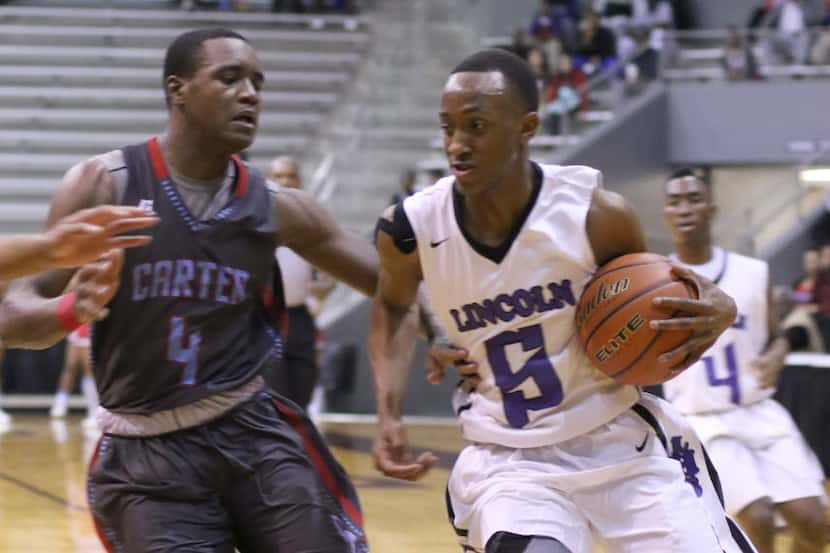 Dallas Lincoln's Kortrijk Miles (5) races to the basket as he is defended by Dallas Carter's...