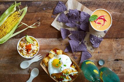 Velvet Taco's sides include red-curry-coconut queso, elotes (grilled corn), and tater tots. 