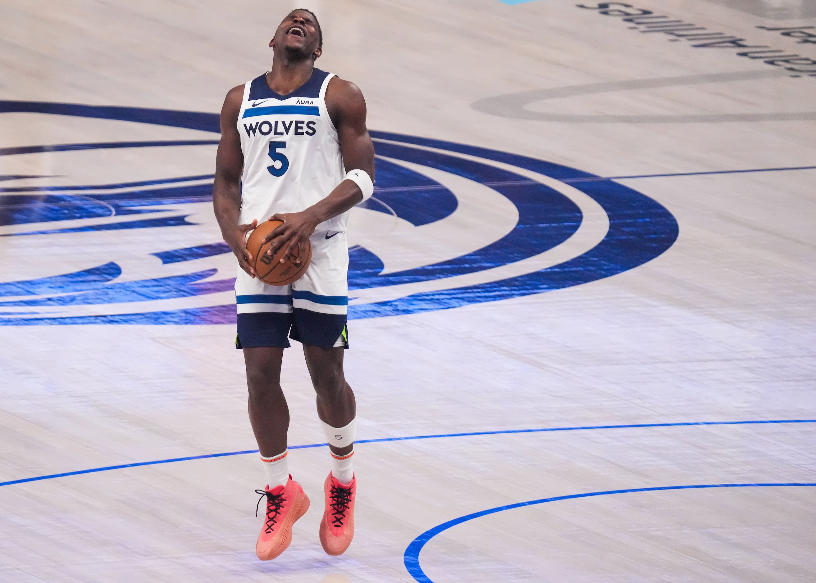 Minnesota Timberwolves guard Anthony Edwards (5) reacts after being called for a foul during...