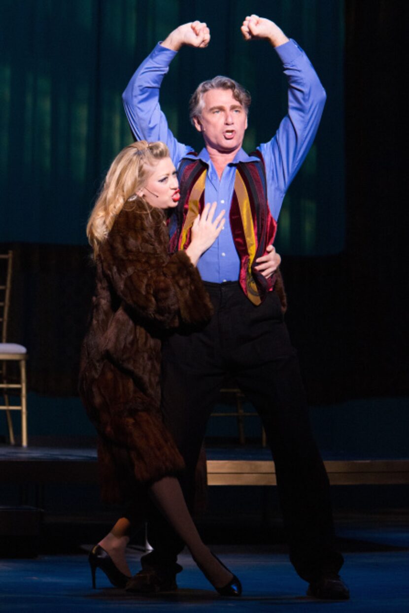 Danielle Estes  embraces Christopher Carl in a duet during Lyric Stage's presentation of...