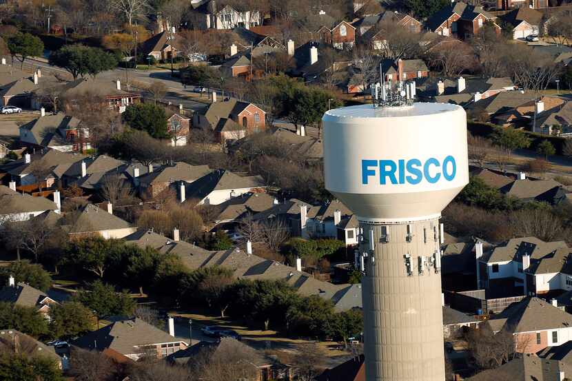 Frisco water tower and homes in Frisco, Texas on Friday, February 28, 2020.
