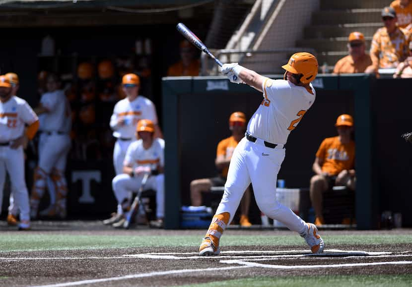 Tennessee's Blake Burke (25) drives in a run against Evansville during an NCAA college...