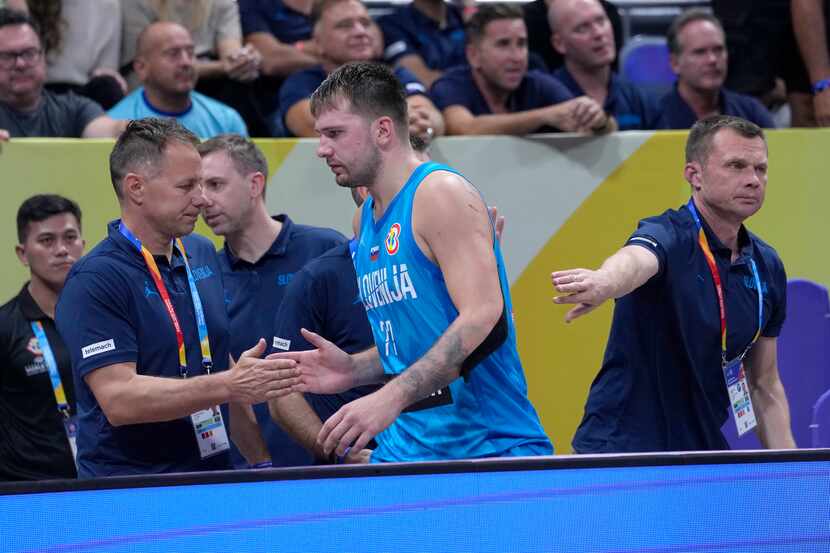 Slovenia's Luka Doncic heads off after receiving his second technical foul during the second...
