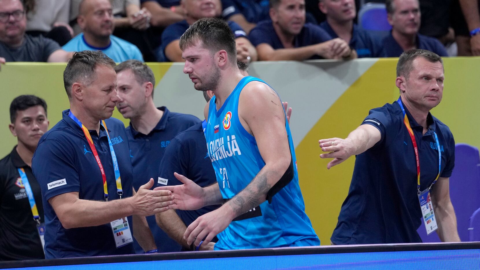 Slovenia's Luka Doncic heads off after receiving his second technical foul during the second...
