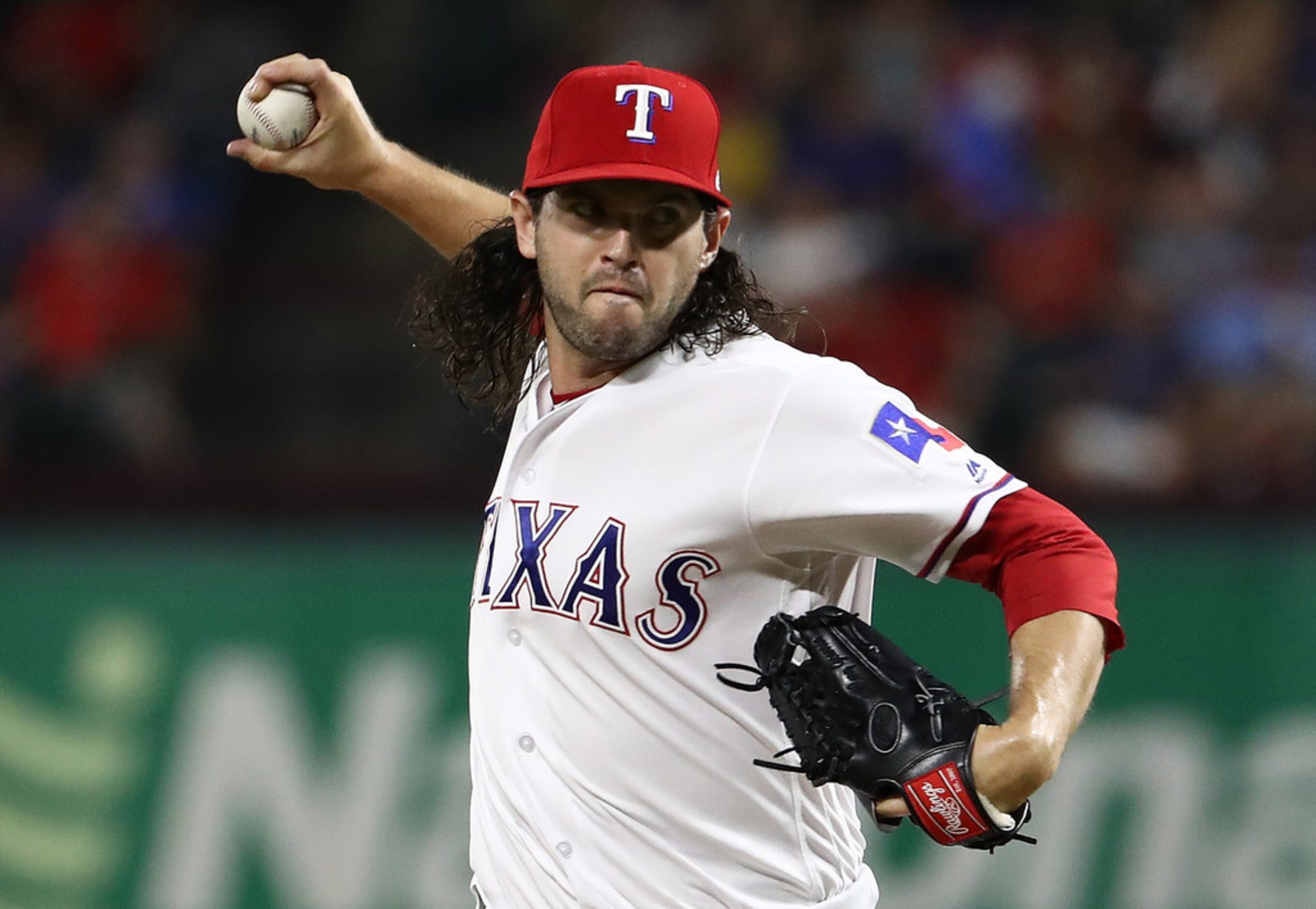 ARLINGTON, TX - JULY 25:  Cory Gearrin #44 of the Texas Rangers throws against the Oakland...