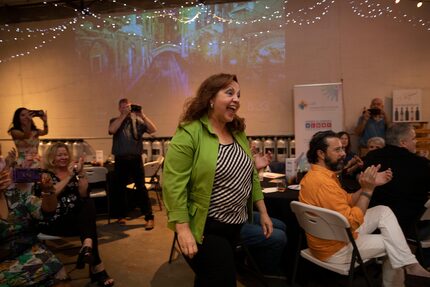 Lydia Gonzalez reacts to receiving a grant for Savorista Kitchen and Catering. The North...