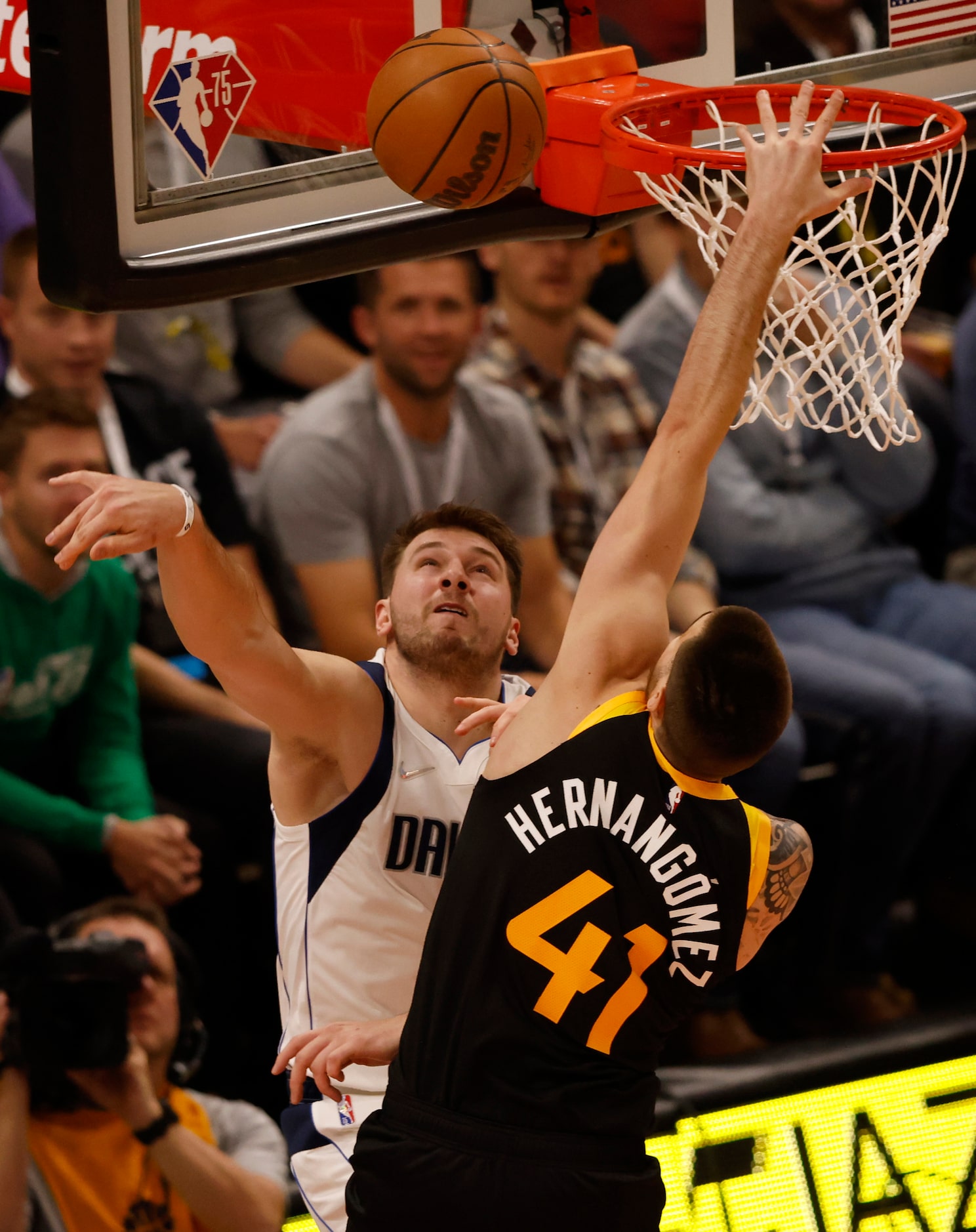 Dallas Mavericks guard Luka Doncic (77) blocks a shot attempt from Utah Jazz forward Juancho...