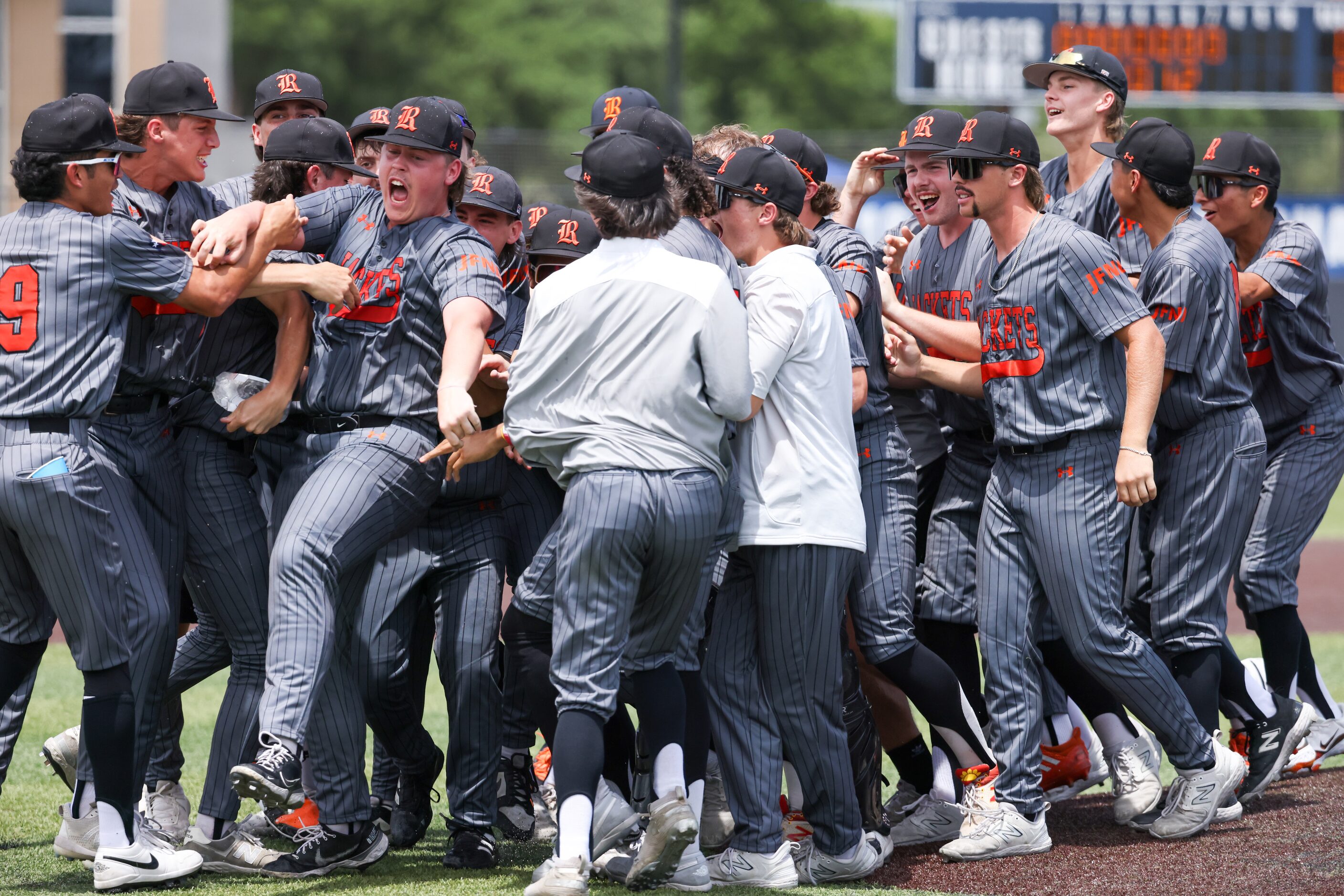 Rockwall celebrates defeating Mansfield in an area round game of the UIL baseball playoffs...