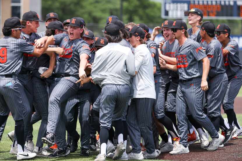 Rockwall celebrates defeating Mansfield in an area round game of the UIL baseball playoffs...