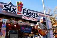 The Julians perform in front of the Silver Star Carousel at Six Flags Over Texas  on,...
