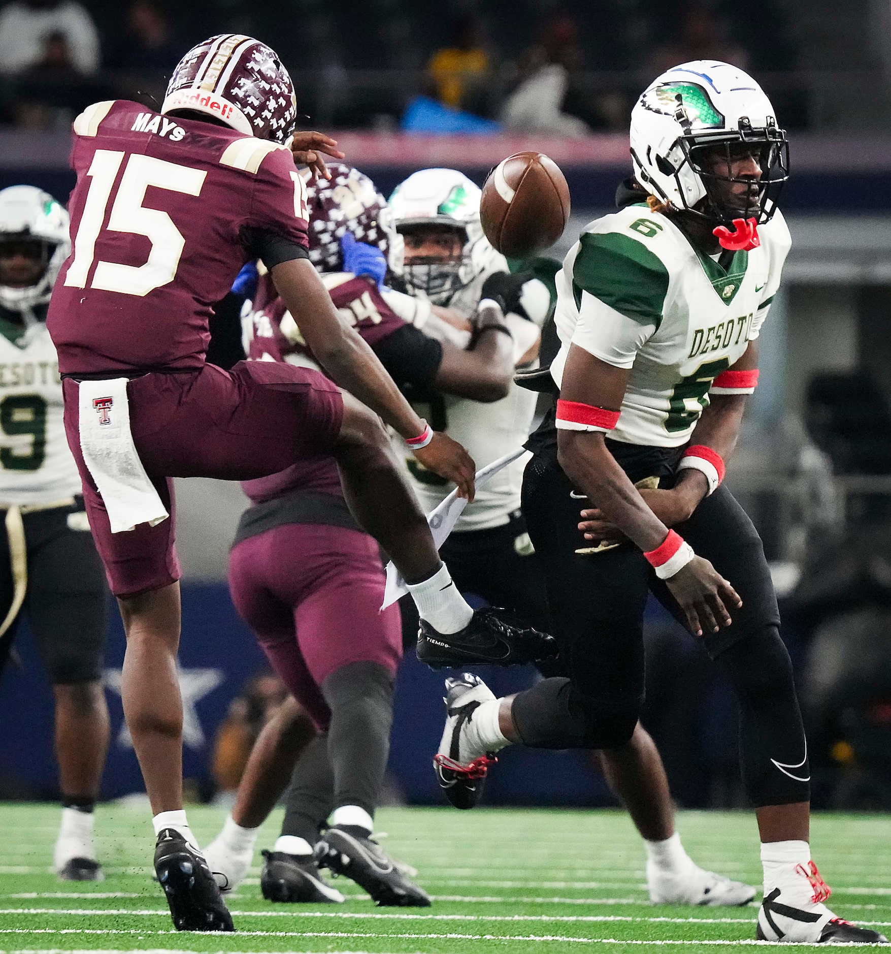 DeSoto defensive back Aundre Wisner (6) blocks a punt by Humble Summer Creek’s Brian Mays...