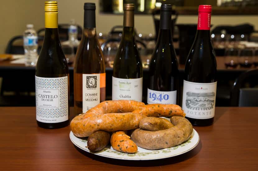 Various samples of boudin paired with wines during a boudin and wine tasting.