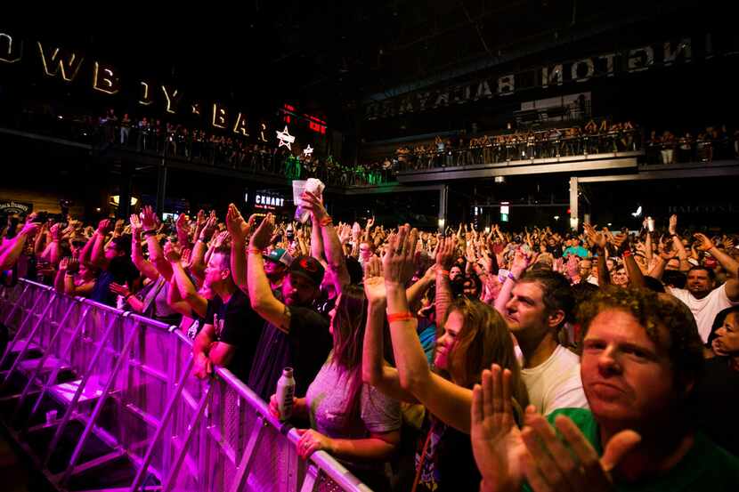 Guests cheer for the Toadies during the grand opening celebration for Texas Live! on...