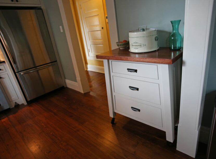 A custom piece of furniture in the kitchen of Jackie and Doug Sweat's home on Junius Street...