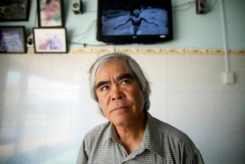 In this March 29, 2012 file photo, Associated Press photographer Huynh Cong "Nick" Ut visits...