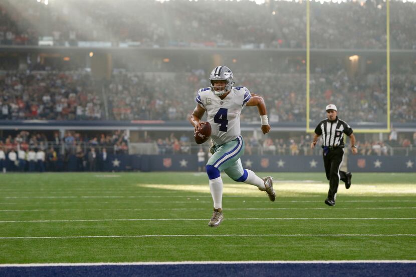 Dallas Cowboys quarterback Dak Prescott (4) runs for a touchdown against the Kansas City...