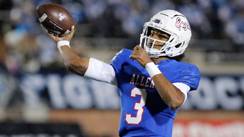 Allen High School quarterback Mike Hawkins (3) threw a touchdown pass during the first half...