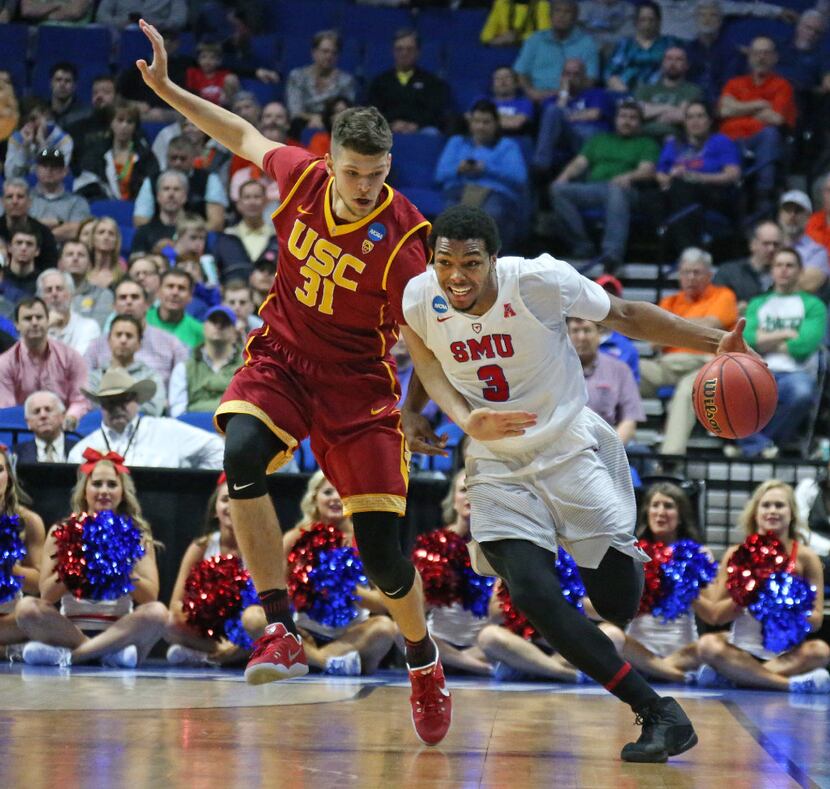 SMU guard Sterling Brown (3) heads downcourt as and USC forward Nick Rakocevic (31)defends...