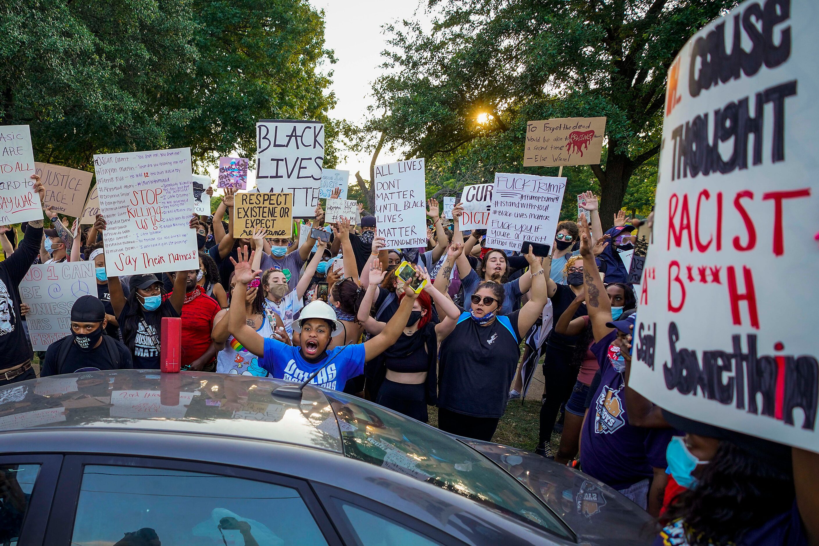 A group of demonstrators gathers at Lake Cliff Park as protests continue after the death of...