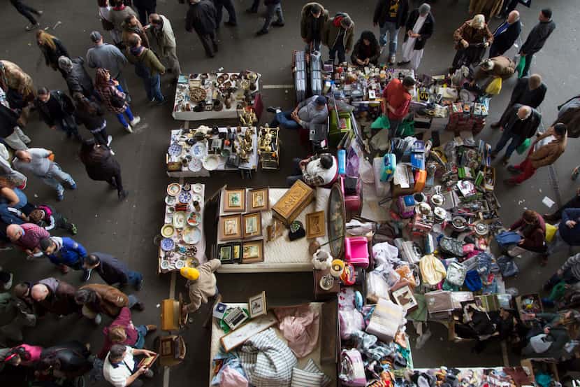 A crowd flocks to a flea market in Barcelona, Spain. (Getty Images) 